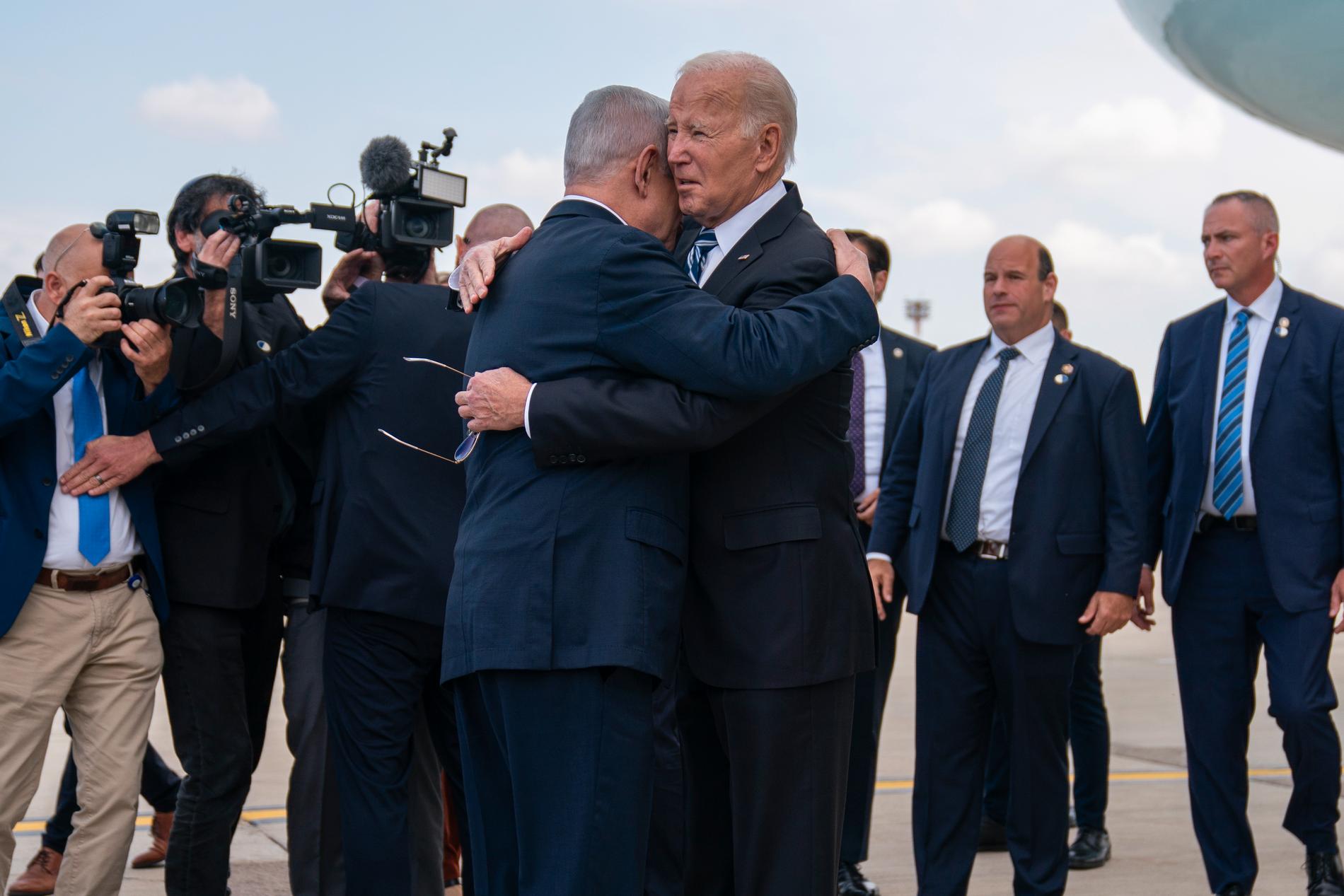NEARBY: Netanyahu and Biden hug each other at Tel Aviv airport. 
