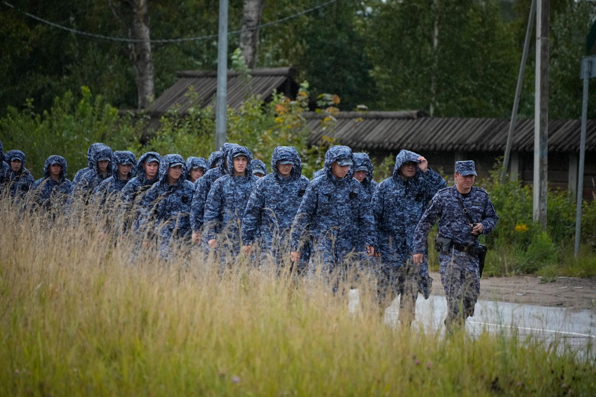 Rosgvardia soldiers are photographed during the funeral of former Wagner chief Yevgeny Prigozhin in August 2023.