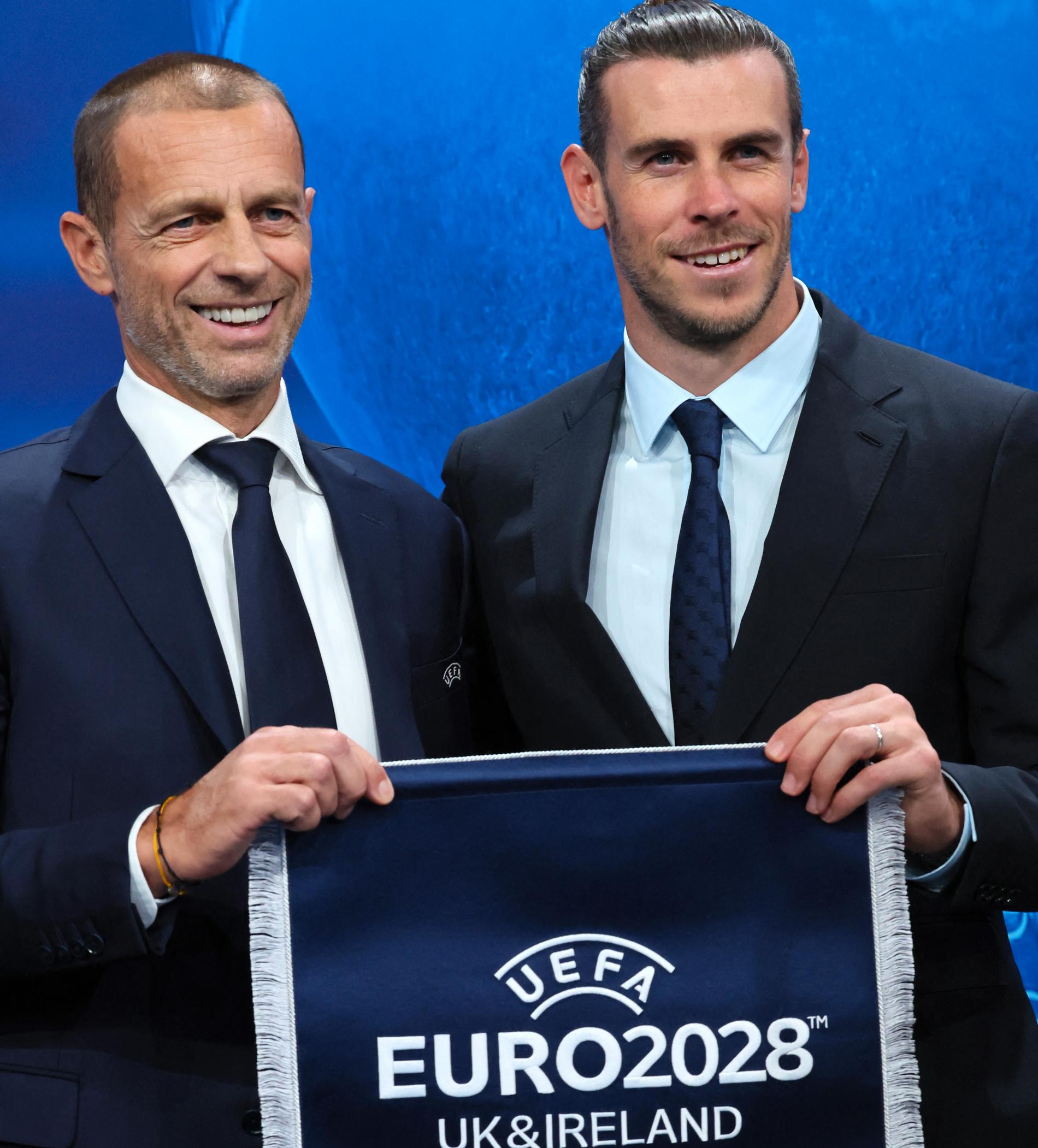 Aleksander Ceferin (TV) with Gareth Bale regarding Tuesday's decision to move the 2028 European Championship to Great Britain and Ireland.