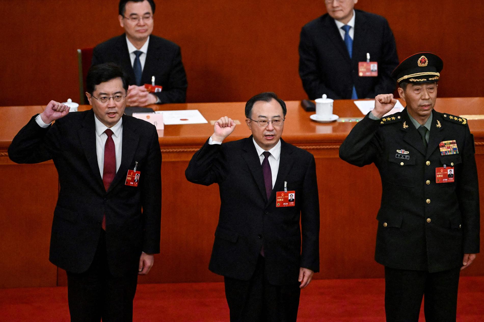Two of the three have disappeared: Foreign Minister Chen Gang (right) and Defense Minister Li Changfu (right).  In the middle, Wu Chenglong. 