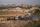 People gather around trucks that come to help in May. Photo: Abdel Karim Hanna/AP 7 NTB