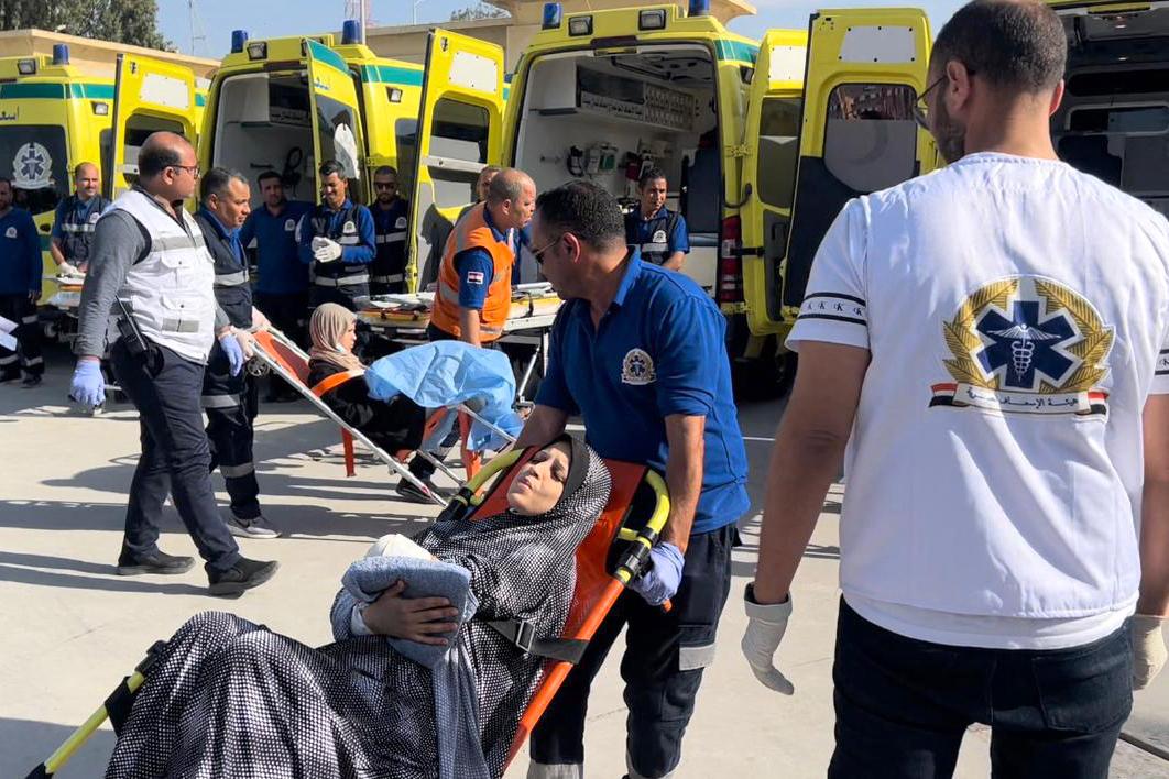 Rafah Crossing: Wounded Palestinians are transported in ambulances from the Rafah Crossing between Gaza and Egypt.