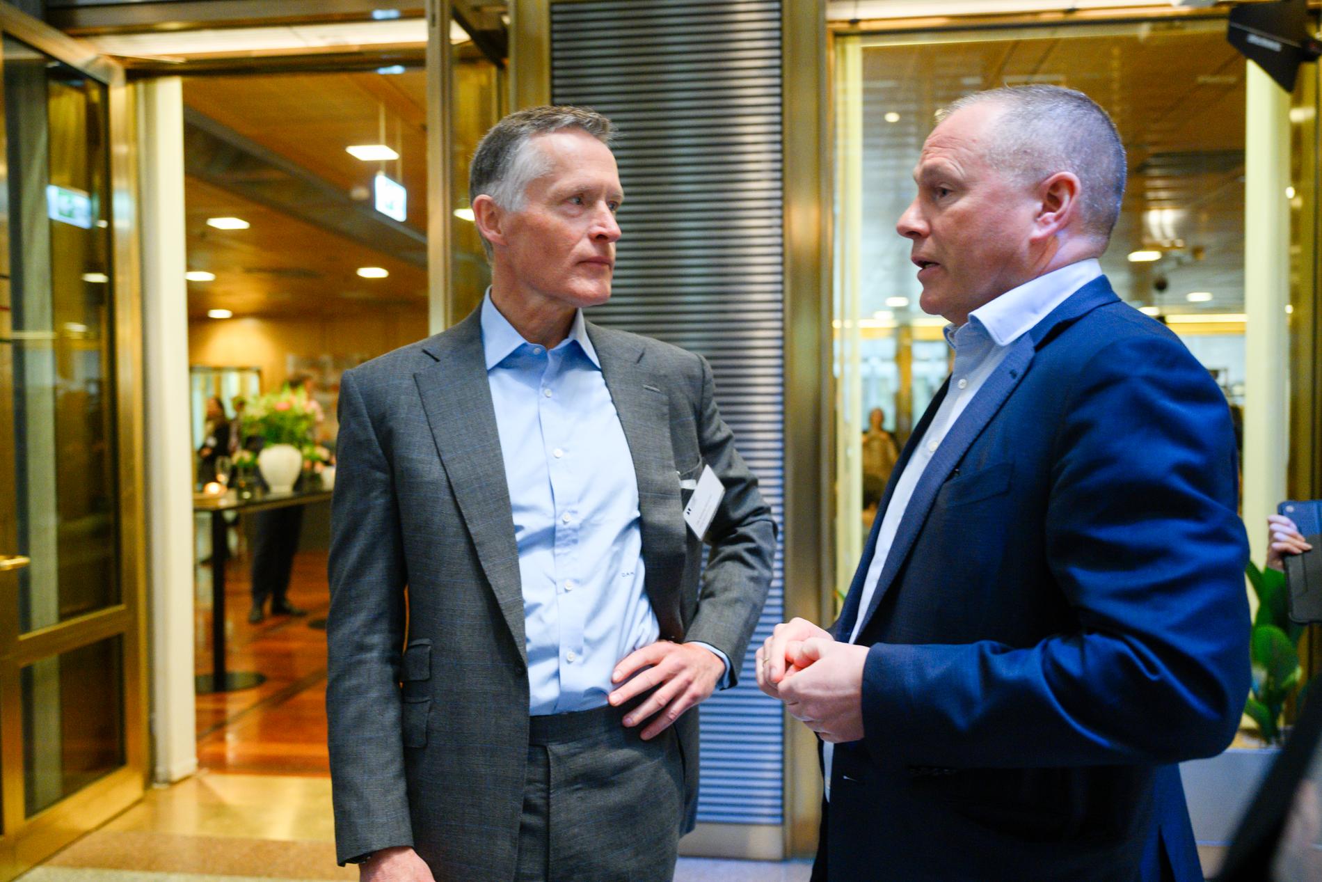 Hedgefondforvalter Ole Andreas Halvorsen sammen med oljefondsjef Nicolai Tangen under oljefondets investeringskonferanse. 